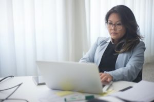 a woman using laptop in Morayfield